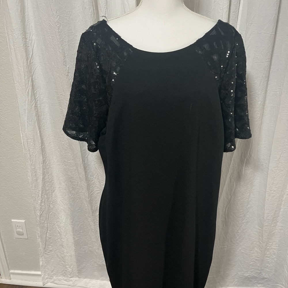Black Calvin Klein dress. Size 14W. Sequins on sleeves. Worn once.